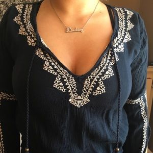 navy blue bohemian top with white stick details